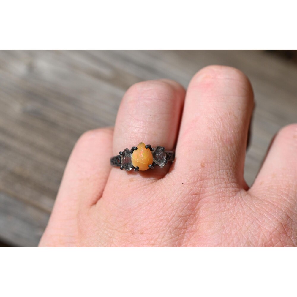 Unique ethiopian opal ring with natural rough cut emerald shaped Lake county cry